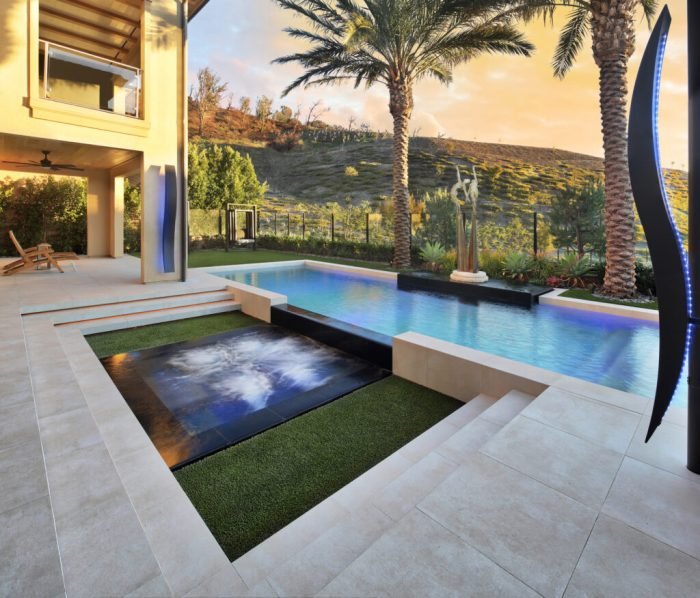 Outdoor pool designs for luxury backyards